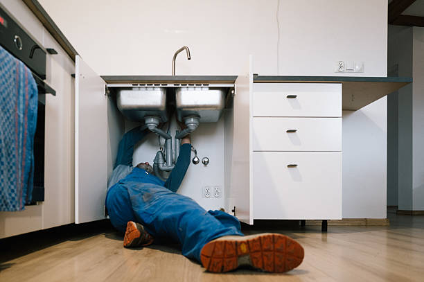 Professional Drain Cleaning technician working in Mission, KS
